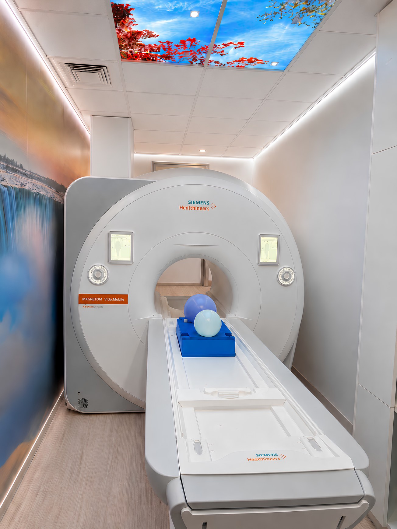 Apex WalkIn MRI scan room with the scanner, patient table and full-height ceiling with a lit skylight